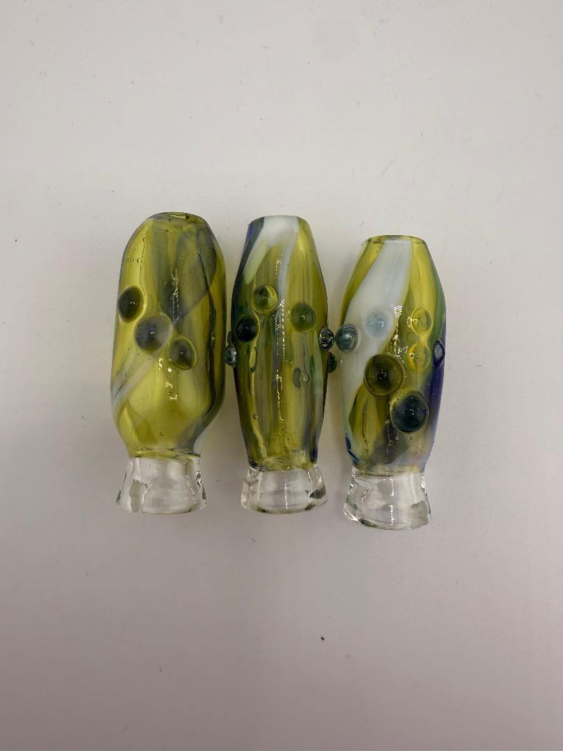 Handcrafted Paulson Pieces Green Puffco Pivot Toppers, showcasing unique designs and vibrant colors for improved dabbing.