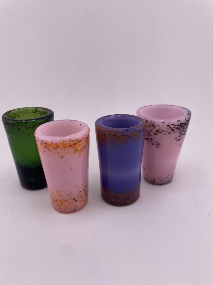 Paulson Pieces Shot Glass in vibrant colors including green, pink, purple, showcasing handcrafted borosilicate glass.