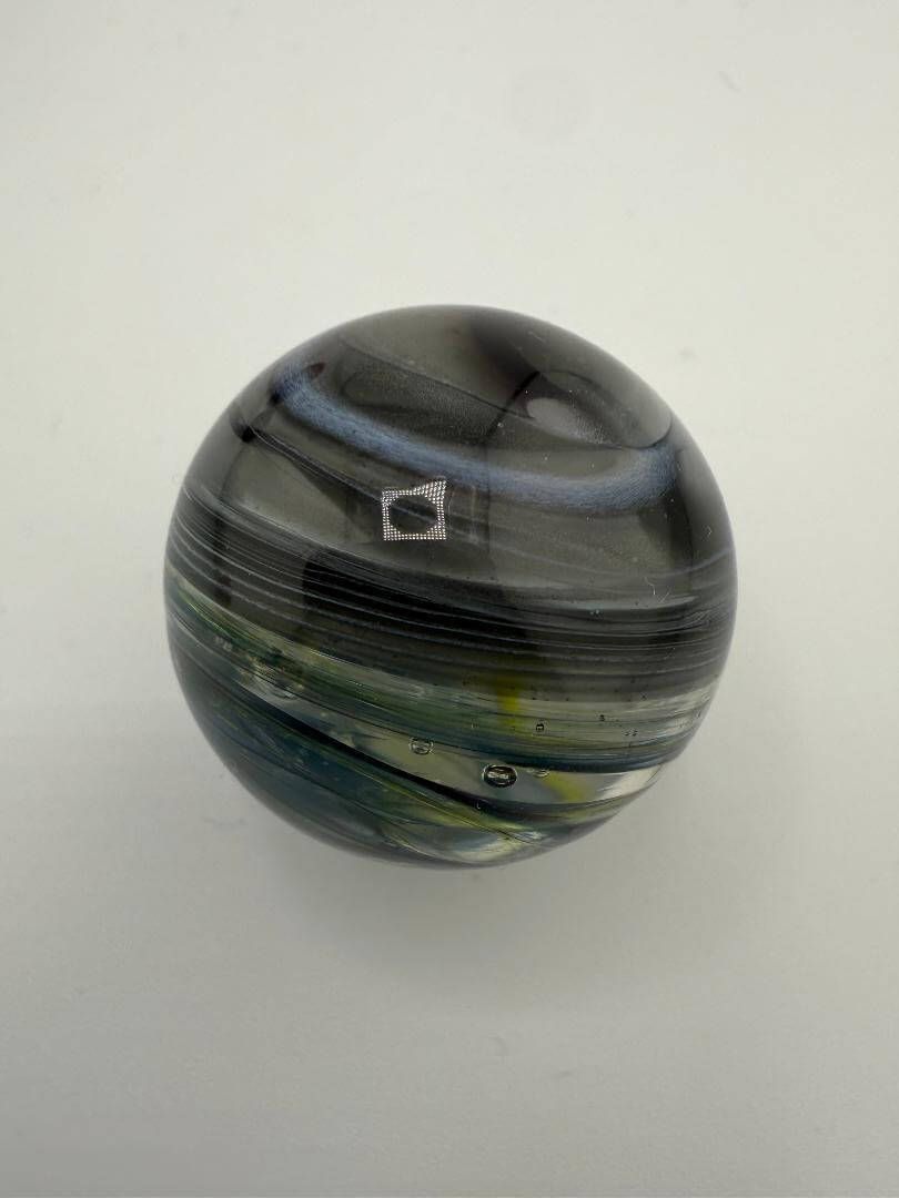 Handcrafted medium-sized marble slurper top by Paulson Pieces, featuring unique swirling colors and designs.
