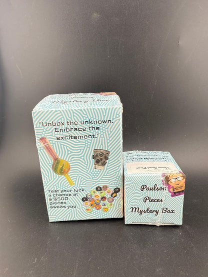 Paulson Pieces Mystery Box - 14mm Bowl Piece packaging with colorful design and text inviting excitement.