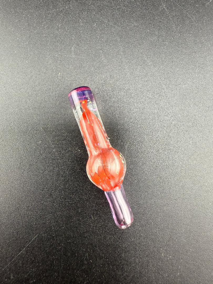 Paulson Pieces Puffco Peak Pro 3DXL Ball Cap - Red Crushed Opal on black surface, showcasing vibrant colors and craftsmanship.