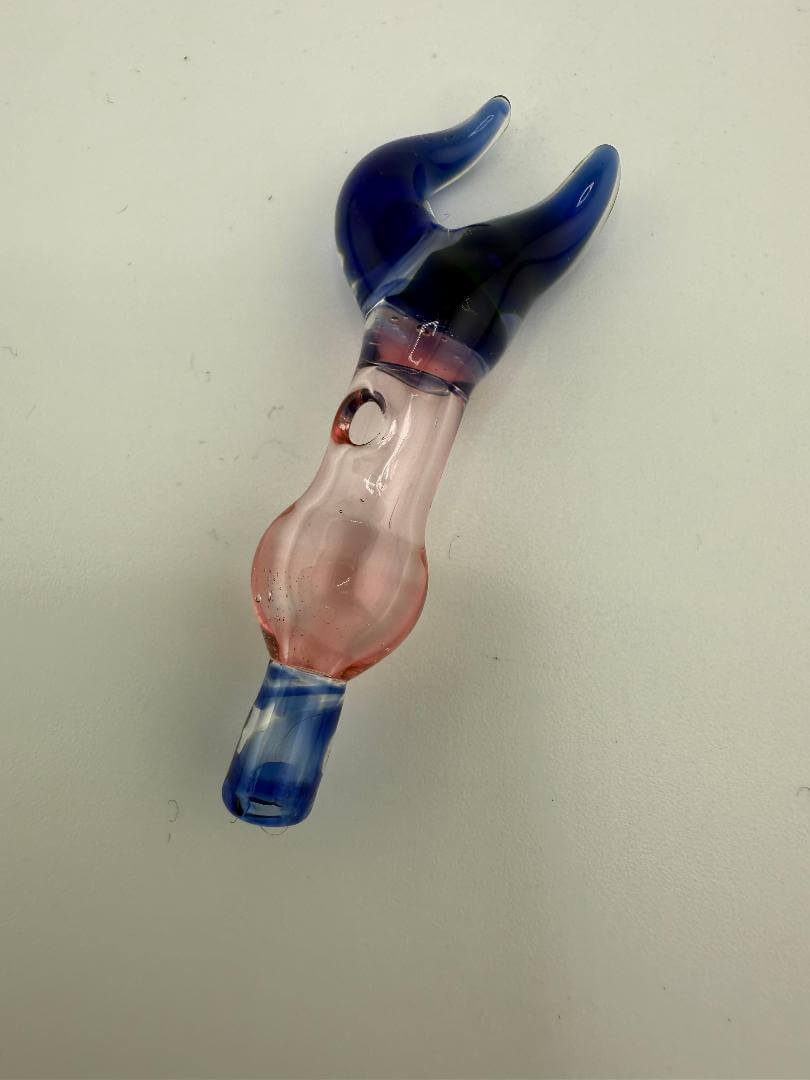 Colorful handcrafted glass joystick with blue and pink accents, designed for Puffco Peak Pro concentrate sessions.