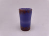 Paulson Pieces Shot Glass in vibrant purple with orange specks, handcrafted from durable borosilicate glass.