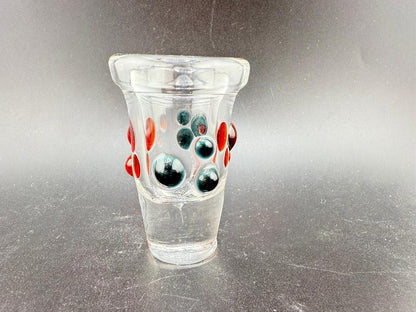 Paulson Pieces Shot Glass showcasing handcrafted design with black and red artistic dots.