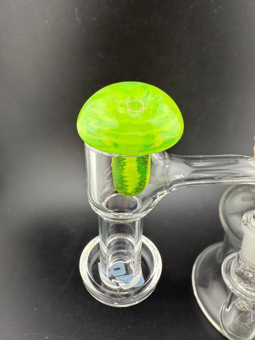 Phatt Mat Glass Dichro Terp Slurper Topper in vibrant green, enhancing dabbing experience with style and functionality.