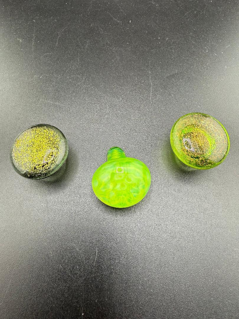 Phatt Mat Glass Dichro Terp Slurper Toppers in green and black, showcasing premium craftsmanship and unique design.