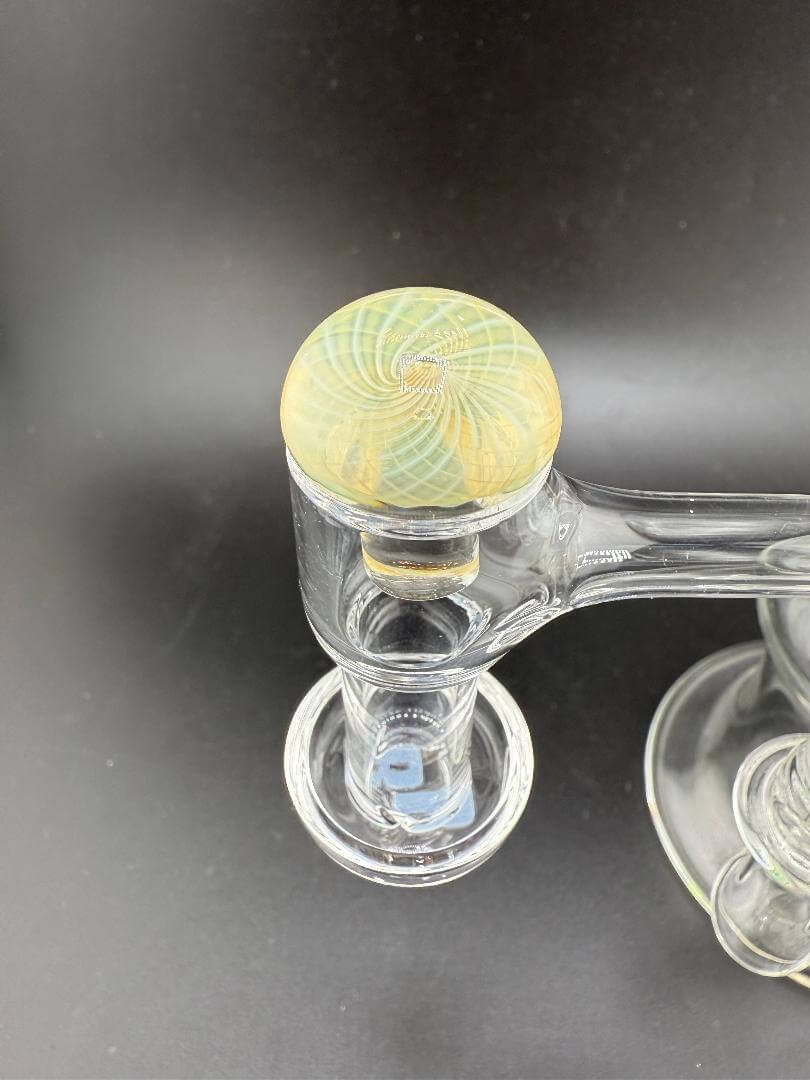 Close-up of the Phatt Mat Glass Fumecello Terp Slurper Cap showcasing intricate design and craftsmanship, perfect for dabbing.
