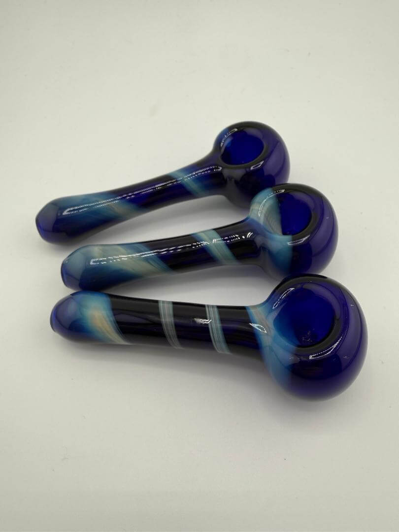 Phillip Glass Blue Swirl Hand Pipe trio, premium handcrafted borosilicate glass pipes for smooth smoking hits.