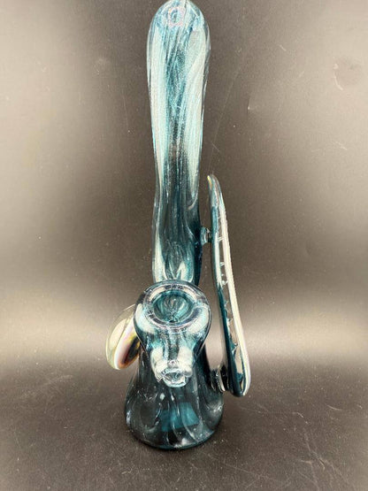 Phranq Glass Bubbler - Blue Stardust w/ Fumed Chaos Pendant & Large Leaf on a dark background, showcasing its elegant design.
