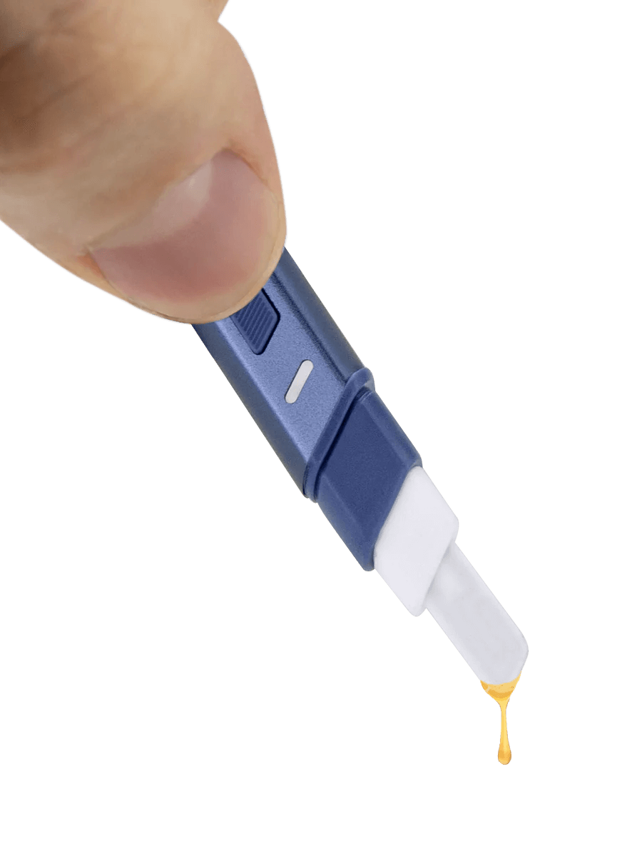Puffco Hot Knife heated loading tool with ceramic tip, releasing extract drop, USB-C rechargeable.