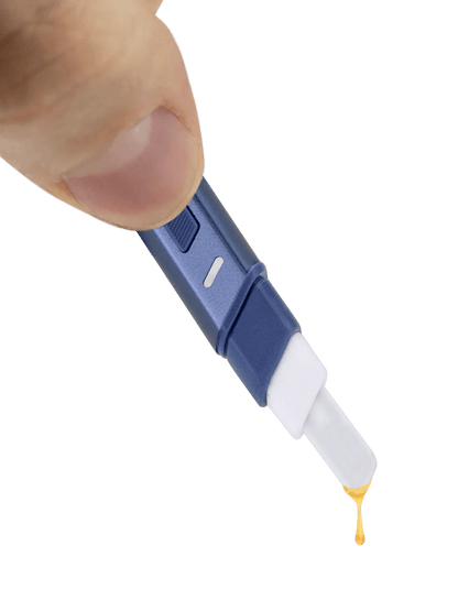 Puffco Hot Knife heated loading tool with ceramic tip, releasing extract drop, USB-C rechargeable.