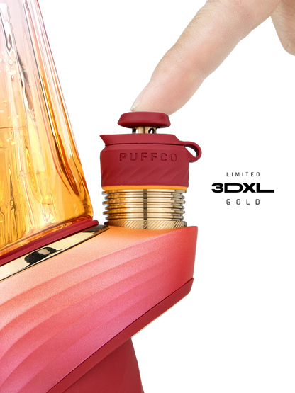 Close-up of Puffco Peak Pro Daybreak device with finger activating the button, showcasing its sleek design and functionality.
