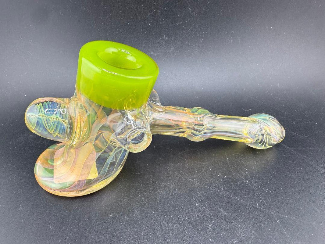 Pugsley Glass Hammer Pipe – Fumed w/ Color Accent Caps & Marbles on a dark surface showcasing its vibrant design.