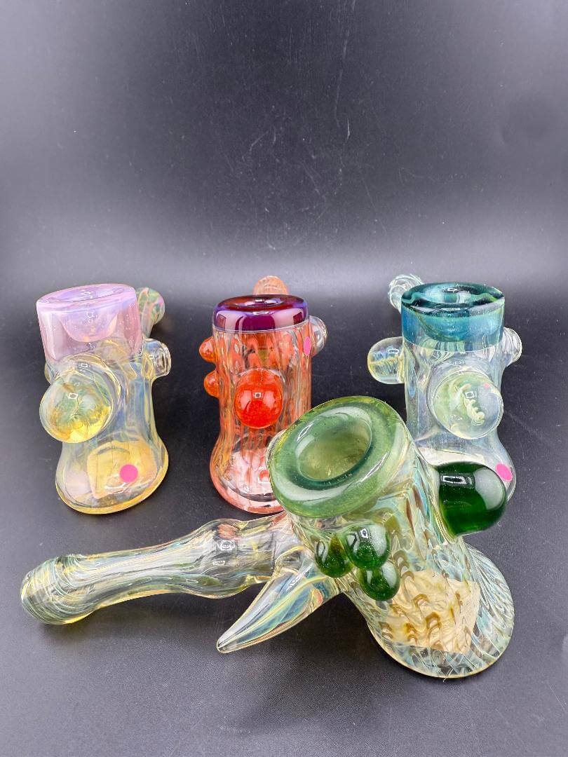 Pugsley Glass Hammer Pipe - Fumed w/ Color Accent Caps & marbles showcasing vibrant colors and unique designs.