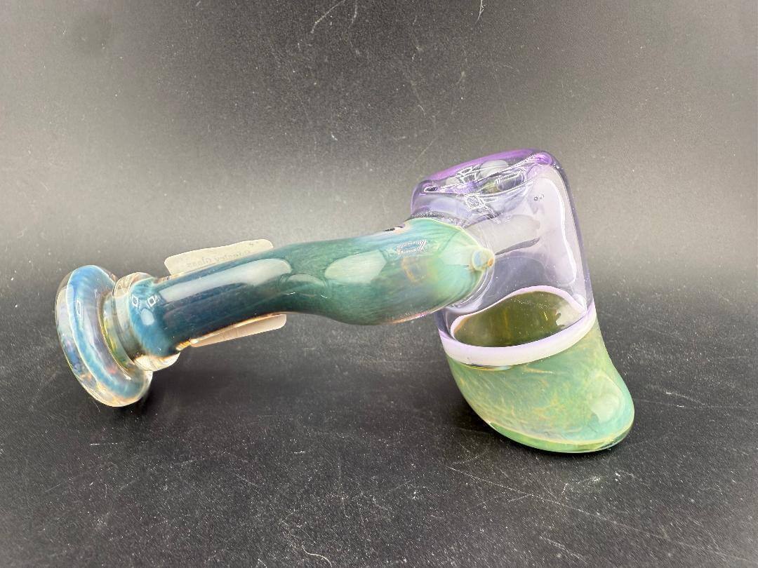 Pugsley Glass Hammer Pipe - Pink & Teal showcasing vibrant colors and unique hammer design for functional art.