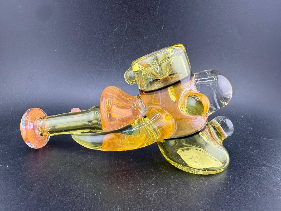 Pugsley Glass Hammer Pipe - Yellow & Fumed Sections w/ Fumed Horn & Marble Attachments on a black background.
