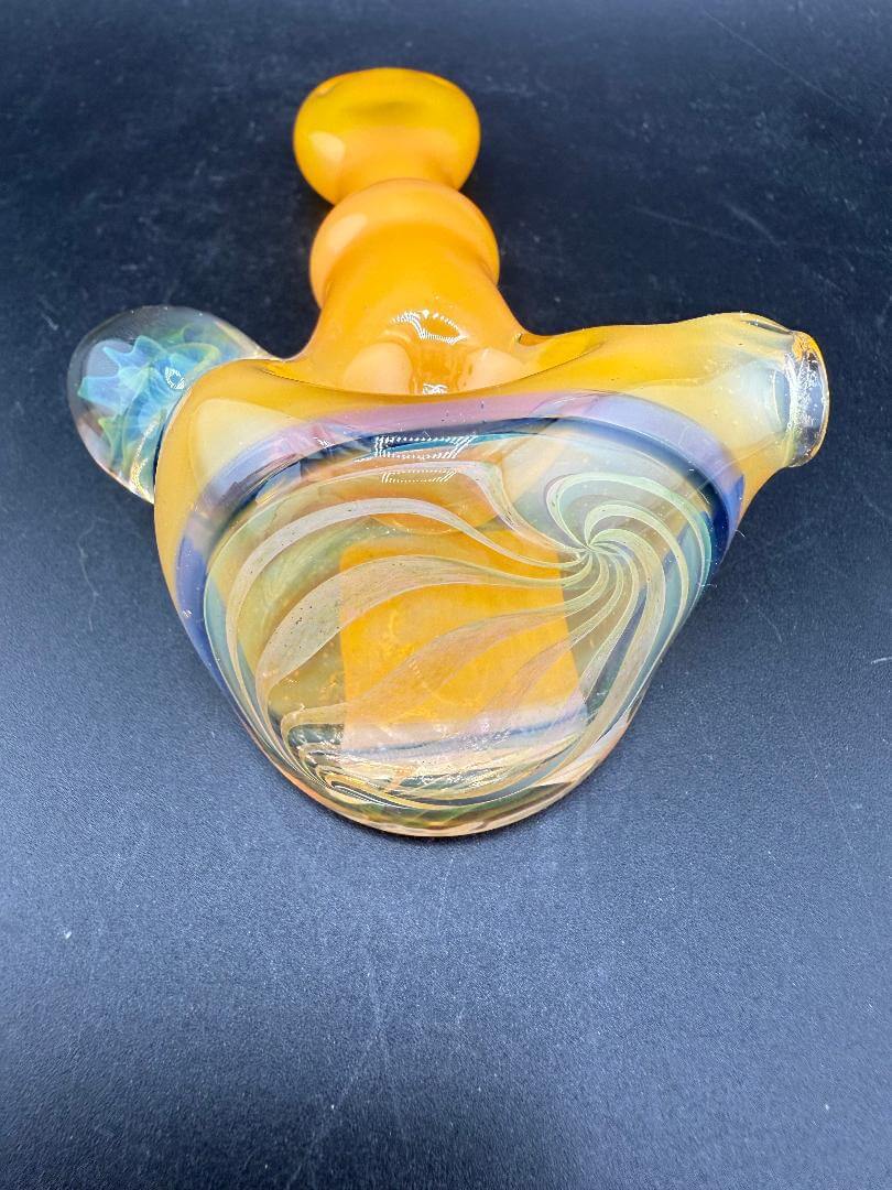 Pugsley Glass Hand Pipe - Orange w/ Fumed Cap & Marble Attachment showcasing its vibrant design and intricate details.