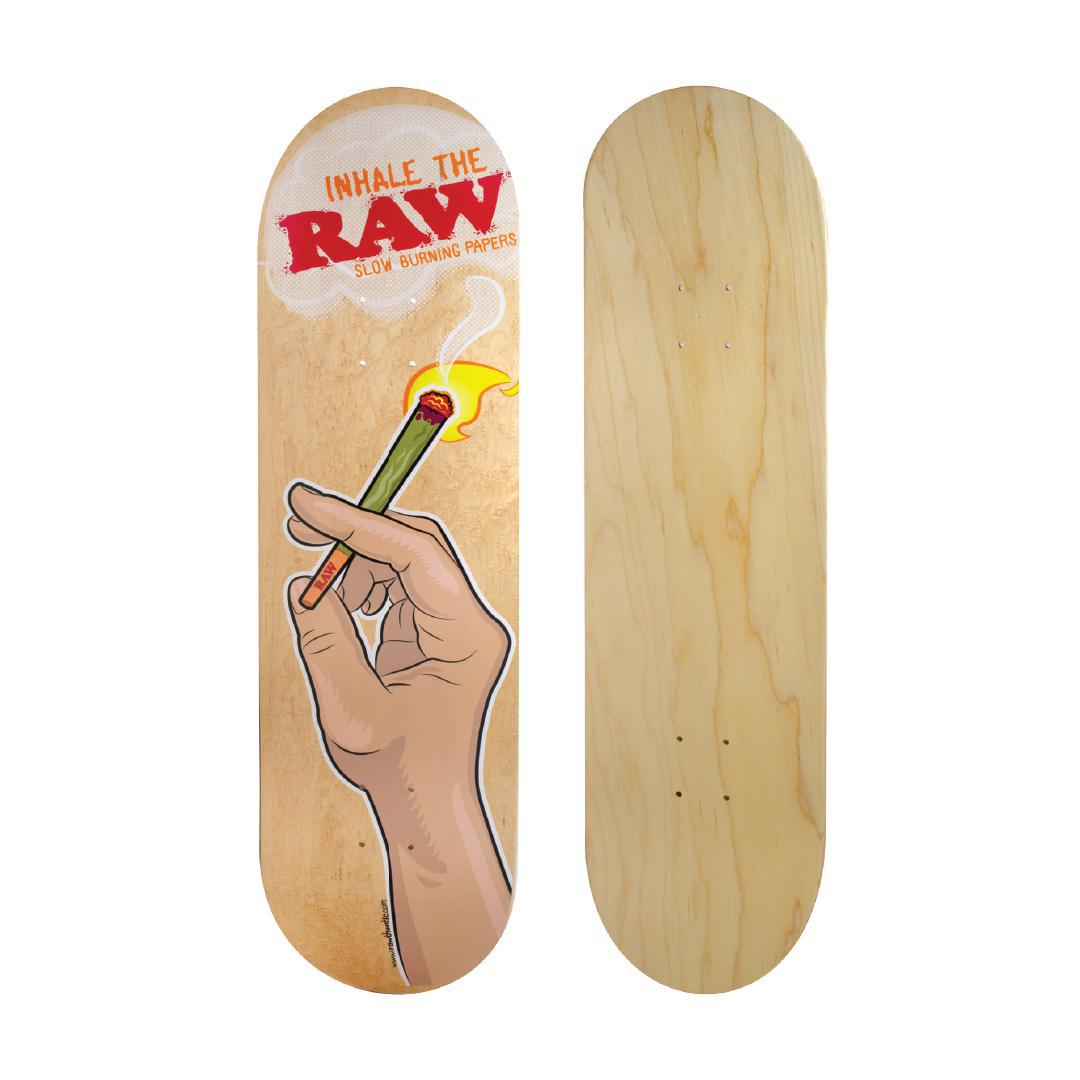 Raw Skateboard featuring bold graphics of a hand holding a cigarette and plain wood on the reverse side.