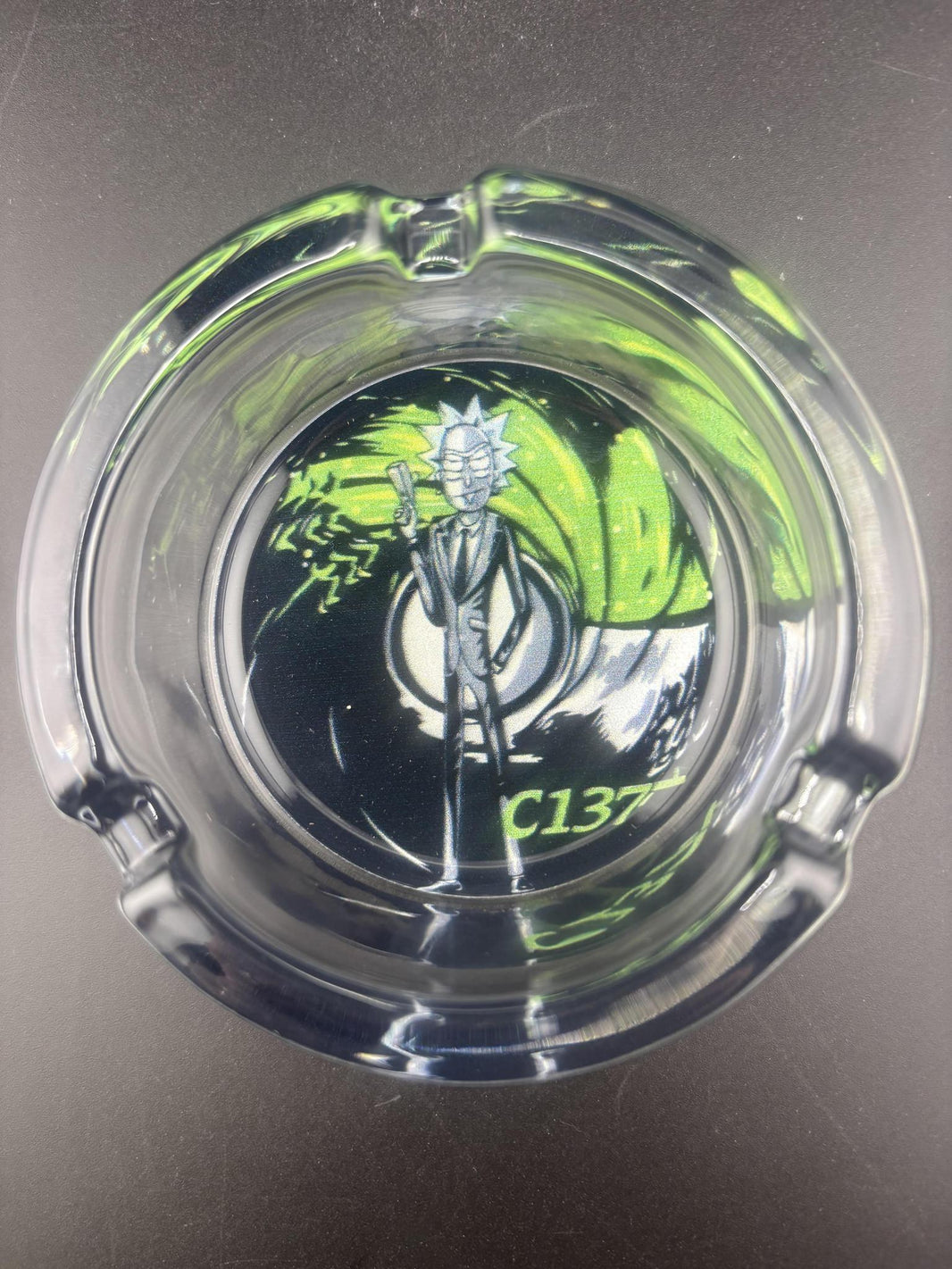Rick and Morty Glass Ash Tray featuring Rick on a colorful design, perfect for smoking sessions.