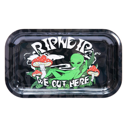RipNDip We Out Here Rolling Tray featuring alien and mushroom graphics, measuring 27x16 cm, on a sleek metal surface.