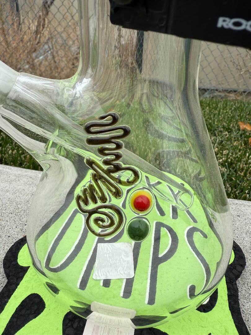 ROOR Glass 14" Beaker 50 x 7mm Thick 14mm 45° - Green with vibrant design details visible.