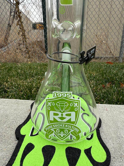 ROOR Glass 14" Beaker 50x5mm Thick Collector Series Beaker w/ Color Matching Bowl & Wooden Stand - Green on display.