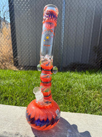 Round Glass Orange And Blue Spiked Bubble beaker 14mm 45° with vibrant colors and unique texture.