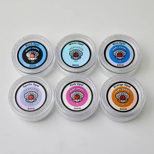 Ruby Pearl Co Terp Pearls - Opal 5mm display featuring various opal colors in 4mm containers.