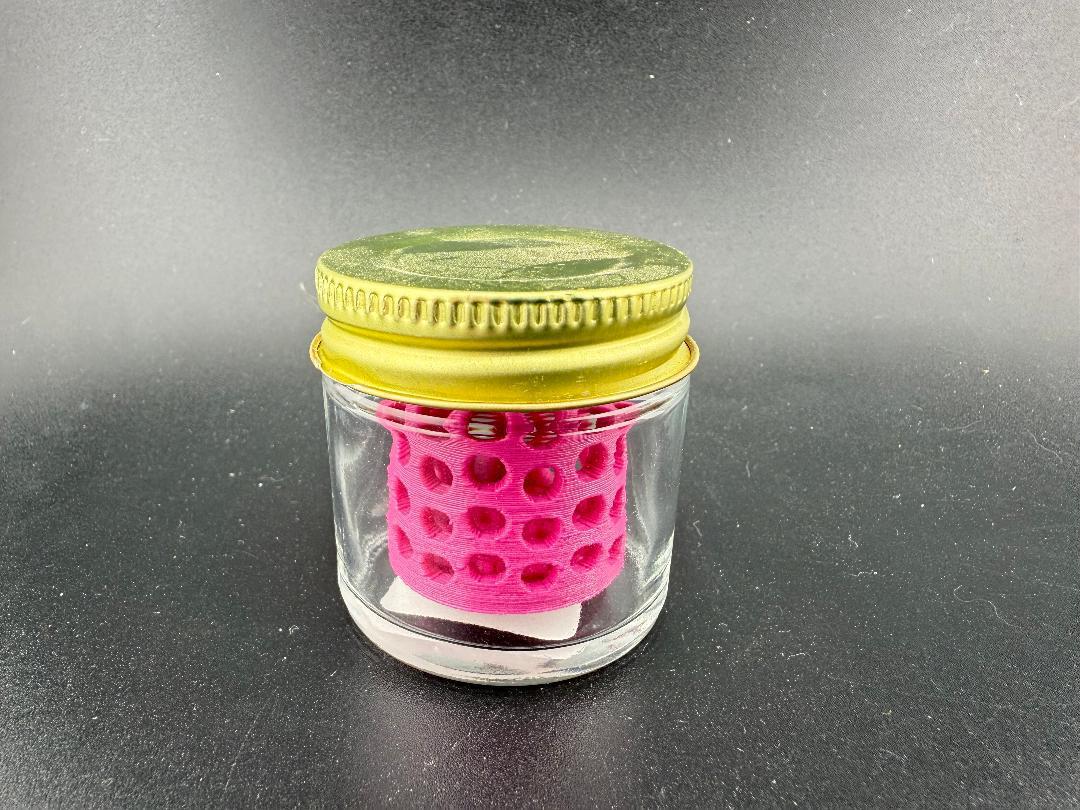 Ruby Pearl Co Pearl Jar Washing Station featuring a glass jar with a pink washing insert.