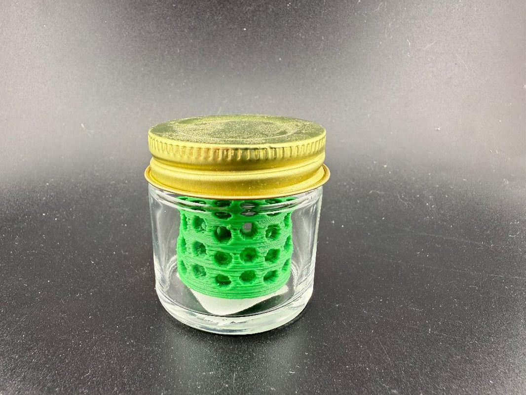 Ruby Pearl Co Pearl Jar Washing Station with green insert in a clear glass jar.