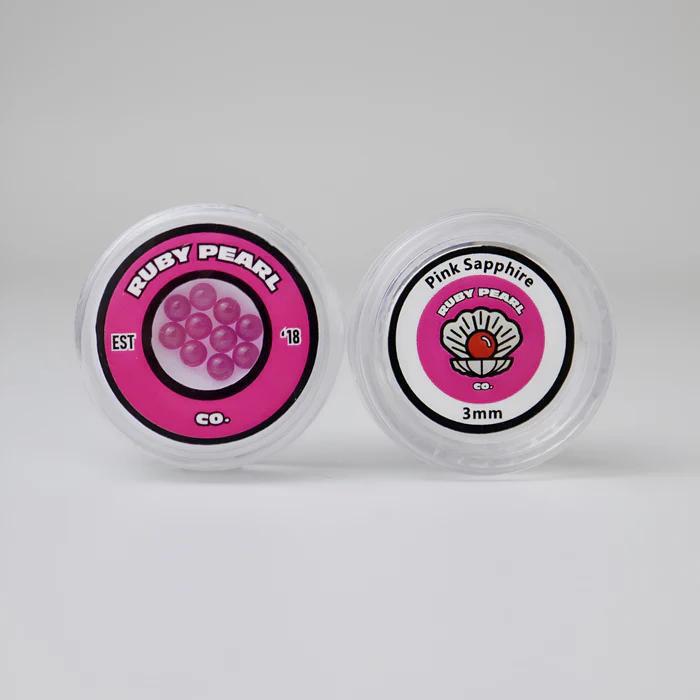 Ruby Pearl Co Terp Pearls – Ruby & Sapphire 3mm AAA Lab-Grown Gemstones (10-Pack) packaging with pink sapphires