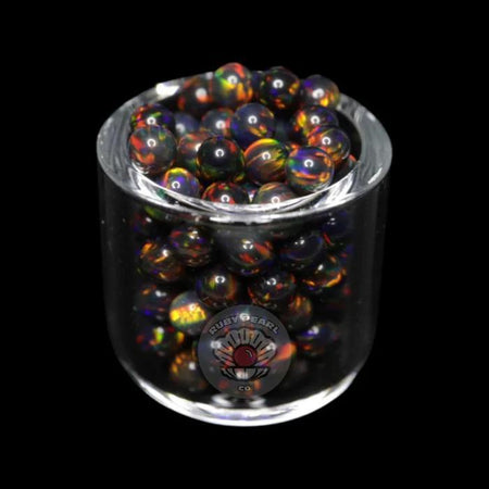 Ruby Pearl Co Terp Pearls – Opal 3mm in a glass container showcasing vibrant colors and unique design.