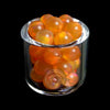 Ruby Pearl Co Terp Pearls - Opal 5mm in a glass container with vibrant orange color.