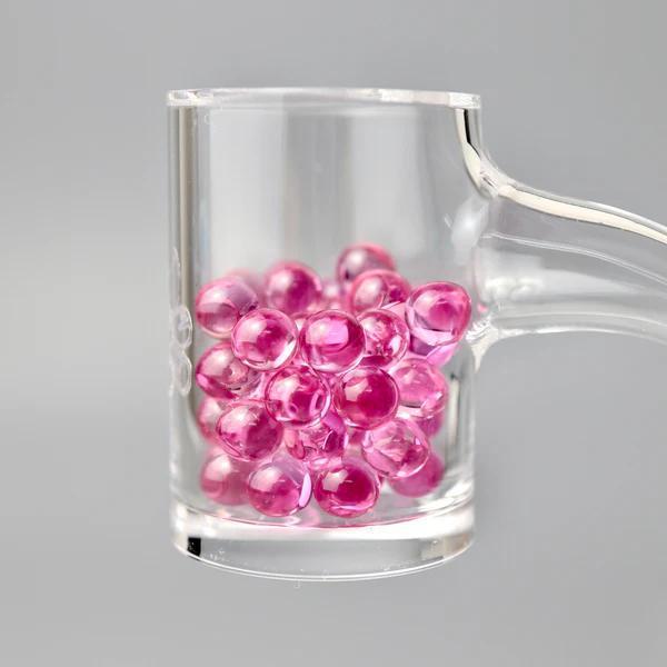 Ruby Pearl Co Terp Pearls - Ruby & Sapphire 5mm in a glass banger for enhanced dabbing experience.
