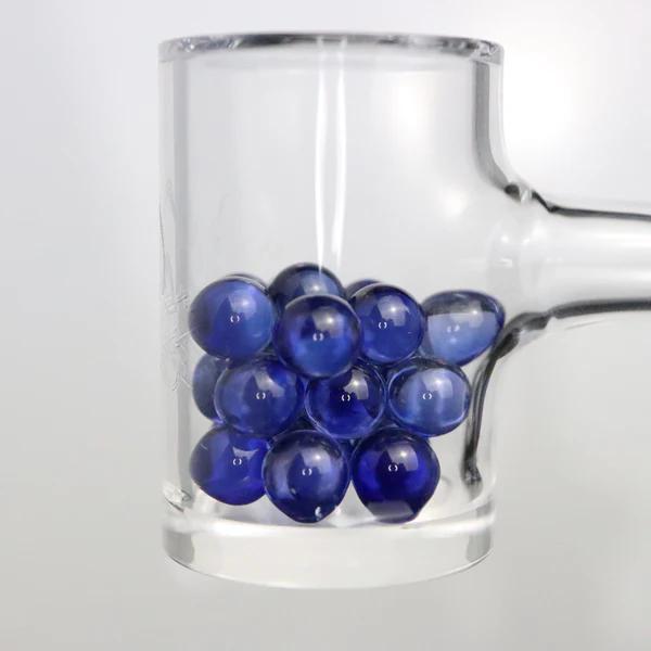 Ruby Pearl Co Terp Pearls – Ruby & Sapphire 6mm AAA Lab-Grown Gemstones (2-Pack) in a quartz banger.