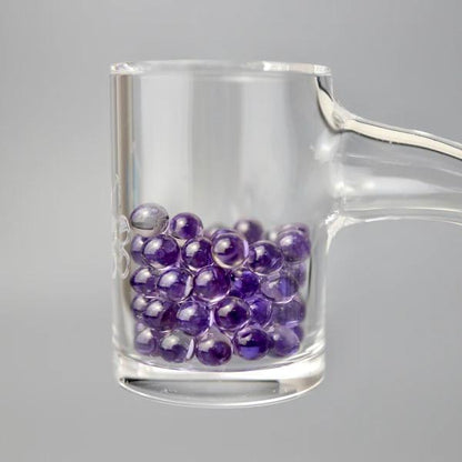 Ruby Pearl Co Terp Pearls – Ruby & Sapphire 4mm AAA Lab-Grown Gemstones (2-Pack) in glass container.