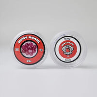Ruby Pearl Co Terp Pearls – Ruby & Sapphire 3mm AAA Lab-Grown Gemstones (10-Pack) in packaging.