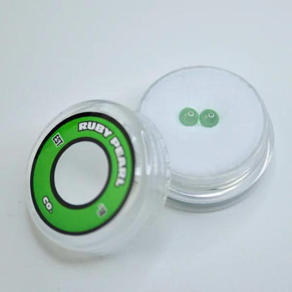 Ruby Pearl Co Terp Pearls – Ruby & Sapphire 4mm AAA Lab-Grown Gemstones (2-Pack) in a clear container.