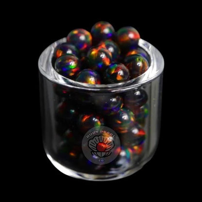 Ruby Pearl Co Terp Pearls – Opal 4mm in a jar, showcasing vibrant colors and smooth performance for dabbing.