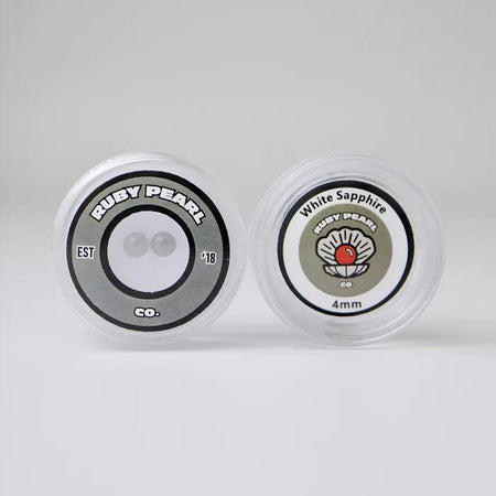 Ruby Pearl Co Terp Pearls – Ruby & Sapphire 4mm AAA Lab-Grown Gemstones (2-Pack) packaging display.