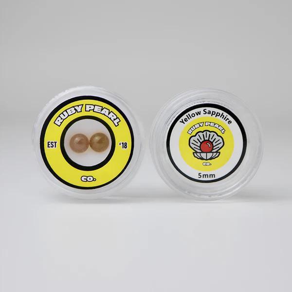 Ruby Pearl Co Terp Pearls - Ruby & Sapphire 5mm product packaging showcasing yellow sapphire pearls.
