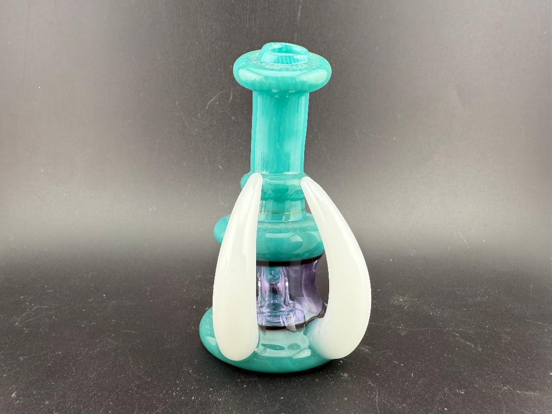 Ruckus Glass 4" Double Horn Micro Rig 14mm 90° in teal and white, designed for flavorful dabs with a bold design.