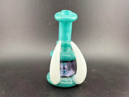 Ruckus Glass 4" Double Horn Micro Rig 14mm 90° in teal and white, designed for flavorful dabs with a bold design.