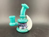 Ruckus Glass 4" Double Horn Micro Rig 14mm 90° in teal color with a unique double horn design.