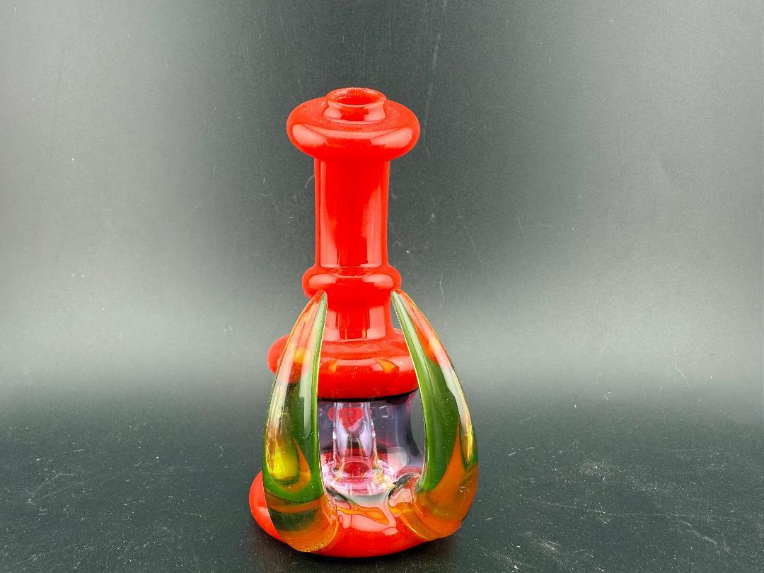 Ruckus Glass 4" Double Horn Micro Rig 14mm 90° in vibrant red with unique design features.