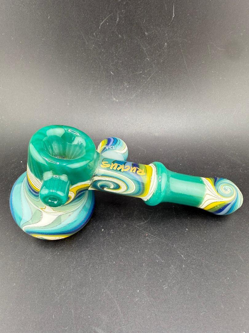 Ruckus Glass Bubbler - 5" Wig Wag showcasing vibrant blue and teal wig wag design with a comfortable bubble shape.