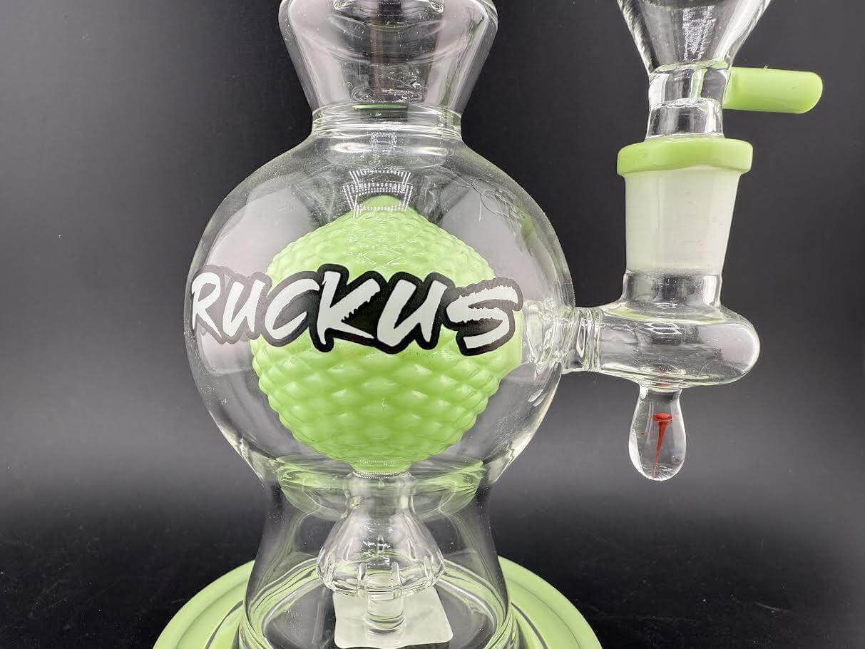 Ruckus Glass 8" Bulb Rig 14mm 90° in green with bulb-shaped chamber for smooth hits.