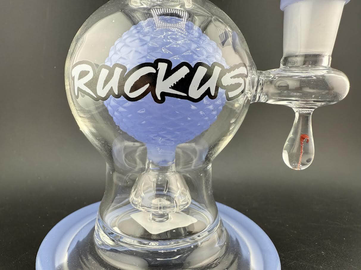 Ruckus Glass 8" Bulb Rig 14mm 90° in purple color, showcasing unique bulb-shaped chamber and superior diffusion.