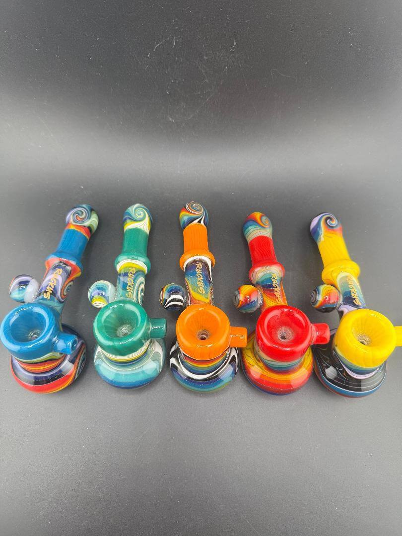 Ruckus Glass Bubbler - 5" Wig Wag, colorful bubble pipes in blue, teal, orange, red, and yellow displayed together.