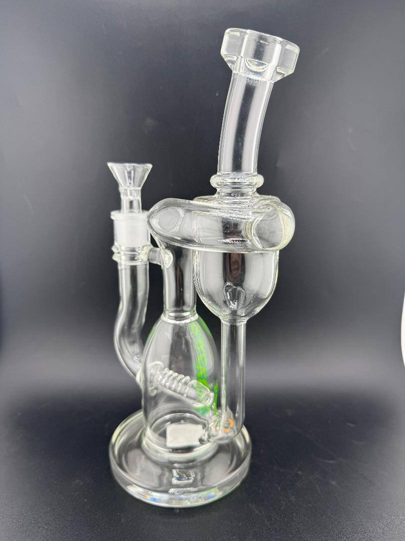 Ruckus Glass Recycler Inline Perc 14mm 90° with clear glass design for exceptional filtration and smooth hits.